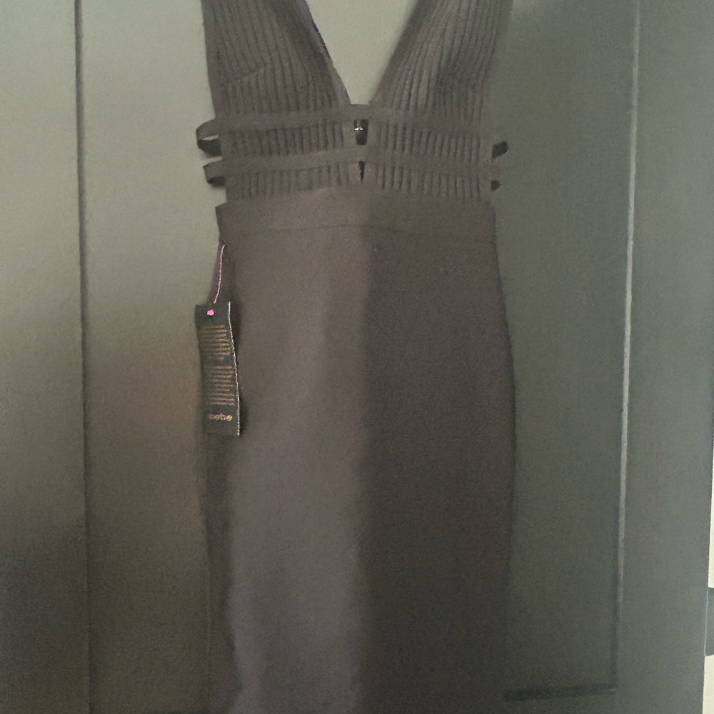Bebe black plug neck bandage dress.